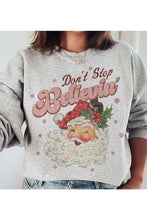 Load image into Gallery viewer, DONT STOP BELIEVIN CHRISTMAS GRAPHIC SWEATSHIRT