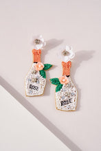 Load image into Gallery viewer, Rose Champagne Bottle Seed Beaded Earrings